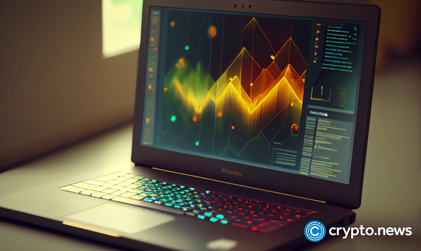 crypto news laptop trading graphics on laptop blurry background low poly