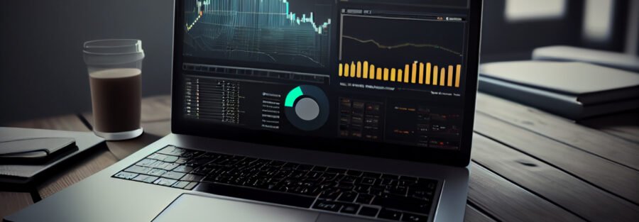 crypto news laptop trading graphics on laptop blurry background low